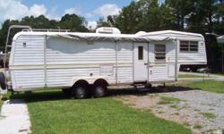 1976 WEll kept nice Kountry AIre Travel Trailer.33 ft long Good tires New spare, new nice $500 bed. NEw lament flooring, large awing, new carpet, stainless sinks, &nbsp;new Frig large stove , mic wave, custom curtains, ample storage , closets and