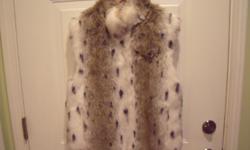 Fabulous Faux Fur Vest all tipped and brushed to realistic effect. Zip front. Lined.