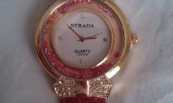 STRADA Pink & White Austrian Crystal Watch in ION Plated Rose Gold - Japanese Movement - Stainless Steel Back and Pink Band. &nbsp;Perfect gift idea for the lady in your life who likes the color pink.