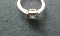 Female silver gem ring you can call for this item, selling time 10am - 6pm - mon - fri.