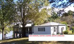 GREAT HOME ON SANTEE COOPER, WITH 3/4 ACRE LOT. SCREEN PORCH OVERLOOKING WATER. PIER FOR FISHING, GREAT RECREATIONAL AREA. STORAGE AREA. NEW METAL ROOF. CALL FOR MORE INFORMATION.
803-469-3434