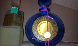 Large fragrance factice bottles,collectible and in excellent condition.call 8086251187