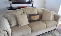 I have a large tan comfy sofa purchased from LazyBoy. &nbsp;This sofa is not new but has not been used a lot since we normally sit in our recliners, so it still looks great and is very comfortable. &nbsp;The covering is tan Chenille.
&nbsp;
If interested,