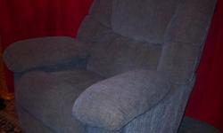 Blue Lazy Boy Recliner with side pockets and heat massage. Very nice!
Leave message.