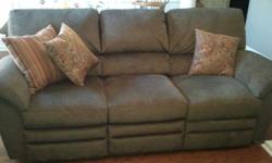 Purchased new&nbsp;2yrs ago,&nbsp;paid $1200. &nbsp;Beautiful dark olive green fabric. Excellent condition. No smokers, no kids, no pets.