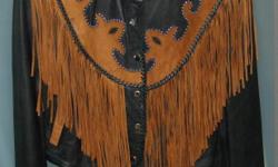 I have a black leather jacket with brown for sale, the size is Medium. My husband bought this jacket at a country music festival in Wisconsin and has never been worn. I am having to downsize and need to sell. Email if interested. Cash only accepted, no