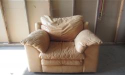 Tan oversized leather chair.&nbsp; Sat in front of a window, so does have some fading, but still very comfortable.
Cash only sale please.