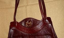 Leather Saddle Style Reddish Brown Leather Bag - looks like it's from the '70s - very retro & unique! Great condition!
PayPal or Google Checkout accepted. I have a 100% seller rating on Ebay (under the account name of hollybee75)
Items ship within 3