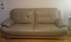 2-piece taupe leather couch and love seat $200