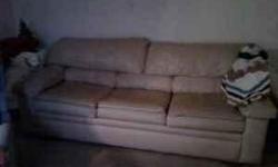 100% CREAM COLORED LEATHER SOFA W/FULL SIZE PULL OUT BED. LESS THAN 2 YRS OLD. EXCELLENT CONDITION. ONE SMALL RIP IN SEAM BACK OF SOFA. NOT NOTICEABLE AT ALL. ASKING 200.00. PRICE IS NEGOTIABLE.