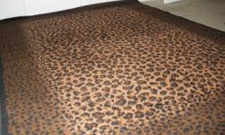 Beautiful rug LEOPARD PRINT size 7 feet 3 inches by 5 feet 3 inches.
Like New with tags. From Suadia Arabia.
Has browns, tans and black colors in it. Beautiful Rug.!!