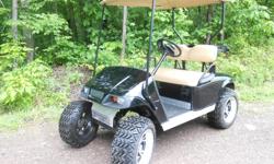 2005 E-Z Go PDS, New Black Body, New US2200 Battereis, Diamond Tread Plate Trim Kit, 14 Inch Optimus Aluminum Wheels, BacklashX All Terrain Tires, Molded Lights Front and Rear, Other Carts Available