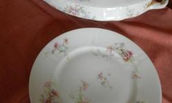 Theodore Haviland Fine China
Almost complete set for 12 with various accessory items. 12 cups, relish dish, 1 small platter, 12 saucers, 1 gravy boat, 1 covered tureen, 1 serving bowl, 12 bread and butter, 11 dessert plates,11 dinner plates, 1 cookie