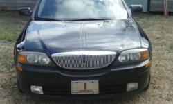 CLEAN BLACK LINCOLN Ls THAT'S FULLY LOADED.....2000 LINCOLN LS 137kMILES... DRIVES GREAT,LOOKS GREAT, V-8 ENGINE , TRANSMISSION STRONG,POWER SEATS,POWER WINDOWS,LEATHER INTERIOR IN GREAT SHAPE,BODY IN GREAT SHAPE, CD PLAYER,SUNROOF, HEAT AND AC BLOWS