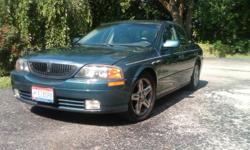 2001 Lincoln LS V8 Sports package with Chrome wheels and Sunroof. Garage kept. Aqua Blue. Salesman's car with 264,000 highway miles. Good condition. Well maintained. Have copies of all service records. Non smoker. Power everything. Very clean interior.