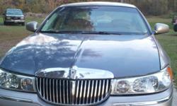 2000 Lincoln Town Car.&nbsp; Executive.&nbsp; 158,000 miles.&nbsp;Champagne color.&nbsp; New grill and headlights.&nbsp; Door and hood replaced (blue) due to damage when deer got in my way. &nbsp;Runs smooth.&nbsp; &nbsp;$2,000.00 OBO
