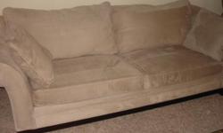 I have a Living Room SOFA for sale. Included in listing is an 8 foot long sofa which is Taupe in color and made of Microfiber. It has rich dark wood legs. Asking $250.00. This SOFA is in very good condition. It was originally purchased at Rooms to Go