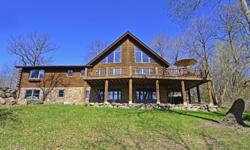 Amazing Log Home! 1 hour from Cities. 223 ft on Lake Marie with 2 wooded acres. Featuring; vaulted ceiling, loft, 2 spectacular fieldstone fireplaces, new appliances, huge deck, privacey, awesome views! Come relax! Amazing buy!
