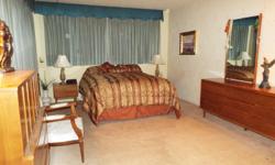 Large very nicely furnished Master Bedroom for an individual or a couple with private bathroom and boudoir in roomy home in north Santa Ana. Includes utilities and use of high speed internet and laundry room. Convenient to freeway [I-5] with plenty of on