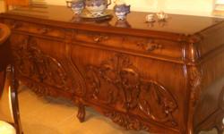 1 oval table with 2 extentions/each 1foot
w/6 chairs
1 buffet
Italian Wood/dinningroom Beautiful&Elegant
