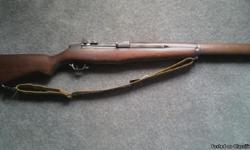 M-1 Garand Early 700k serial number, with someearly parts, locking bar rear site, uncut op rod, milled trigger group, good candidate for a restoration gun.