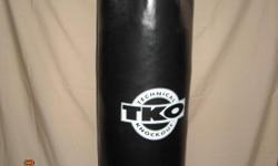 Here is the perfect item for a work out or just taking out your frustration. This a s full length punching bag for karate, Tae Kwon Do, Kenpo or boxing . It comes with a very stout chain. It is like new. It hasn't been used much over the past years so it