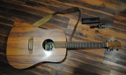Martin Acoustic
Great shape, very rich, deep base sound
comes with Vibrato tuner, and few music books...Dave Mathews, 3 Doors Down, Jummy Buffret, Pat Green