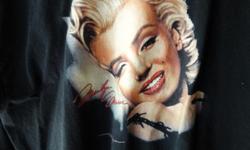 new w/ marylin 's face & autograph on front
color is black
no S&H
visit www.womo101.com
