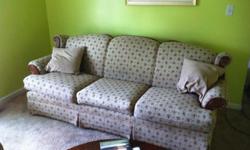 Tan floral matching couch and chair