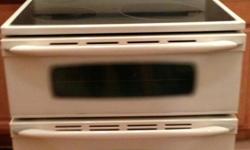 Maytag Stove. Glass top with double oven. 4 burners. Great Condition. Bisque