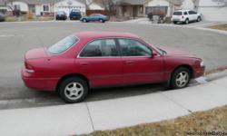 Maroon, 4-door, manual, high mileage but runs good and reliable. Great first car for teen. Clean light gray interior in really good condition. Has radio with aux outlet for iPod. Power windows, doors. Tires really good with 85% tread. Some oxidation on