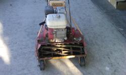 20" blade with catch bucket, 7 blade 1/4" to 1,1/4"self propelled with 3.5hp Honda engine easy start, runs great,and works great,no more use for it.