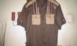 Brown Men Shirt from sm thru 5x Guccis Exclusive Design By Panama CD4 2010...Price on this shirt is Negotiable...You can also purchase the bottom to Pants to Match..Shirt goes for 225.00 whole set special price of $300.00 CALL NOW 214-778-7862
Visit