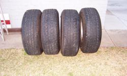 Set of four Michelin LT4 Tires and Wheels.&nbsp; Tire size is LT265/75/R16 with good rubber.&nbsp; The wheels are chrome with 8 lugs and hub caps.&nbsp; These are heavy duty tires and wheels mounted and balanced and will fit GMC, and GM cars and