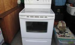 Small mini refrigerator (Haier)(white) asking 50.00 and a white glass top stove( fridgidare) for sale. asking 225.00