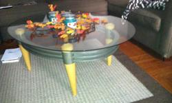I am moving and will be selling my GORGEOUS Modern Coffee Table for $75 (originally purchased for $500) or best offer!
The coffee table is polished light wood and steel with a glass top. The decorations and candles on top of the table as seen in the