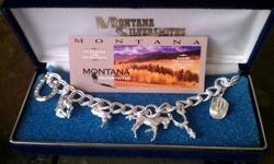 Montana Silversmiths; link style western charm bracelet. New / Never Worn.
Charmes include: Horse Shoe;Cowboy on Bronco;Boot;Horse;Spur & Cowboy Hat.
Montana Armor protective finish.
Care and Maintenance: Use only a damp cloth to clean your Montana