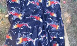 Cute pair of Mossimo boys swim trunks, size XL (14/16). These are in great condition. They are blue with sharks on them.