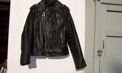 Very nice heavy black leather jacket in good condition, no road rash on the leather.&nbsp; Size 48.&nbsp; I think this will fit a&nbsp; woman or a slender man&nbsp; This is a&nbsp; heavy duty leather jacket that will keep you warm on the road and will