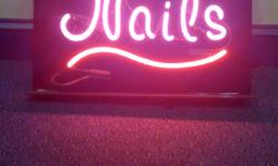 selling a neon sign that reads "nails" perfect for any window for a salon that offers nail services. I paid $200.00 will sell for $75.00 call 410 693-2272