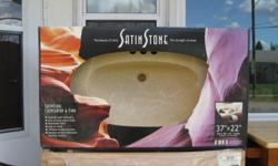 Satin stone brand 37" x 22", fits a 36" x 21" vanity, still in the box, color: sand (tan). Cash only.