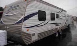 New 2012 CrossRoads RV Zinger 23FB12 Travel Trailer
Perfect Bumper Pull Trailer for Light Travel or 1-2 People Full Time
&nbsp;
Zingers are known for being light-weight.
This is a very nice dining table with a radio just above within arms reach. Just open