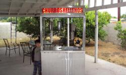 new stainless steel churro machine cart with 2 fillers to make creamed filled churro of what ever flavor you want to use, it has a propane connection, lighted sign, and small storage compartment underneath! text me at 909-630-1259 or iramzq@gmail.com
