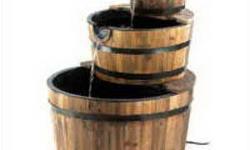 Free Shipping And New In The Box'APPLE BARREL FOUNTAIN
Sparkling waterfalls cascade from spout to spout down the faces of three stacked bushel baskets. This generously sized fountain with genuine wood trim adds bountiful rustic flair to your outdoor