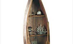 NEW IN THE BOX'ROWBOAT CURIO CABINET AND FREE SHIPPING.
Charming rowboat-shaped shelves handcrafted from finest oak make a perfect spot to display all your nautical curios.
Shelf contents not included. 9 3/4" x 4" x 24 1/2" high. I HAVE 10 Of THis On New