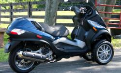 This is your chance to buy basically a new scooter for a used price. It only has 1,300 miles, always garaged.&nbsp; It gets 50+ miles per gallon. This scooter is really fun to drive. I get thumbs up everywhere I ride it because it's awesome looking. It is