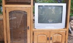 Nice WOOD entertainment center, not pressed wood. Entertainment center and tv with remote $100.00 cash. Located in Clinton. --
&nbsp;