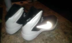 Black/white high top basketball shoes new only worn a few times. Never worn outside only on basketball court. Size 7