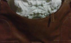 Nice Nine West brown shoulder bag with nice hardware .In good condition .Please text