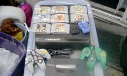 Nintendo 64 Game System
2 controllers (green & grey)
Hyperpak, Jumper Pak
Games included